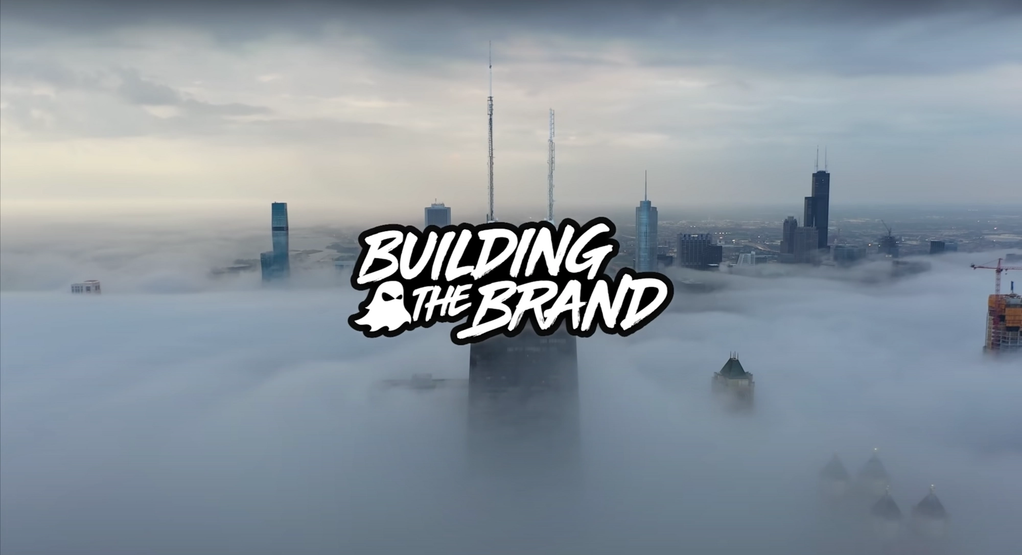 Building the Brand: a skyline rising out of the clouds, title card of the GHOST® series